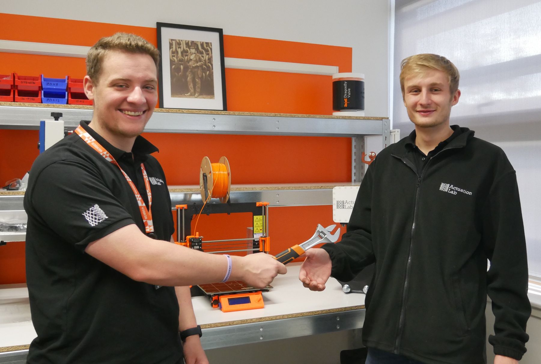 R&D Engineer Matt Hollis welcoming new recruit James Irvin by handing him an adjustable spanner